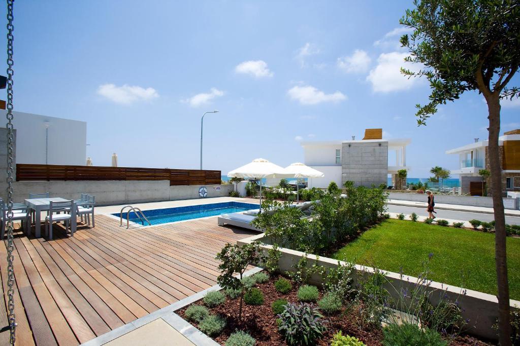 Paradise Cove Luxurious Beach Villas Pafos Quarto foto